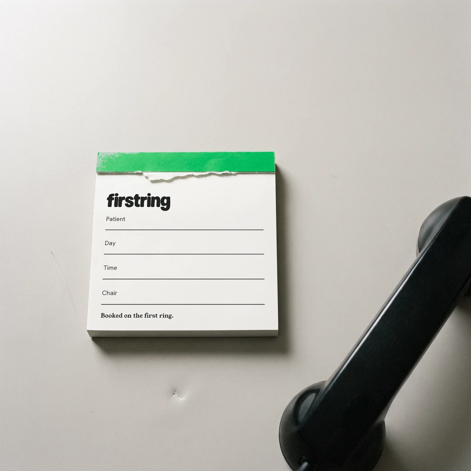 An appointment slip pad with the Firstring mark