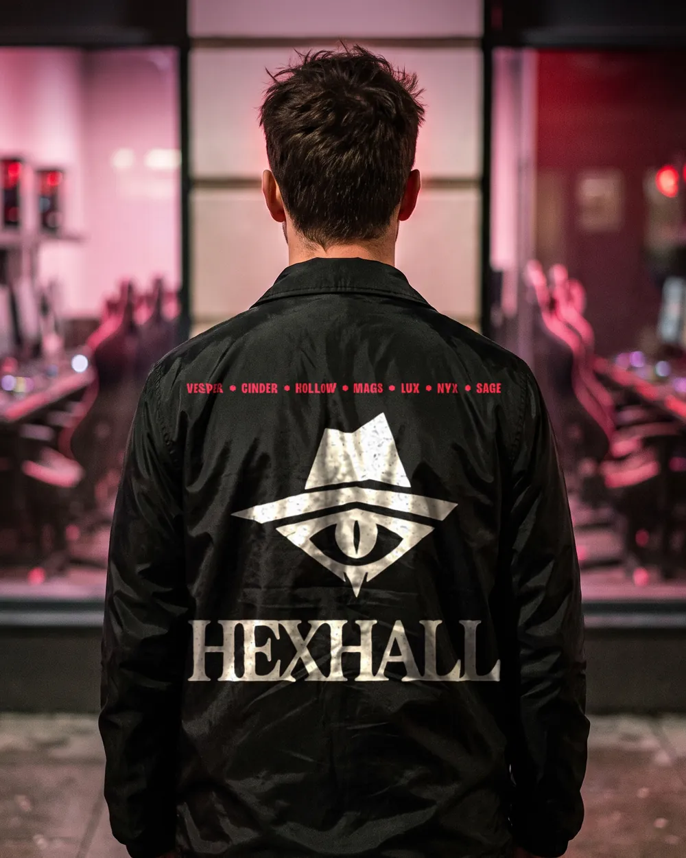 The back of the Vesper coach jacket: the mark and the wordmark in silver
