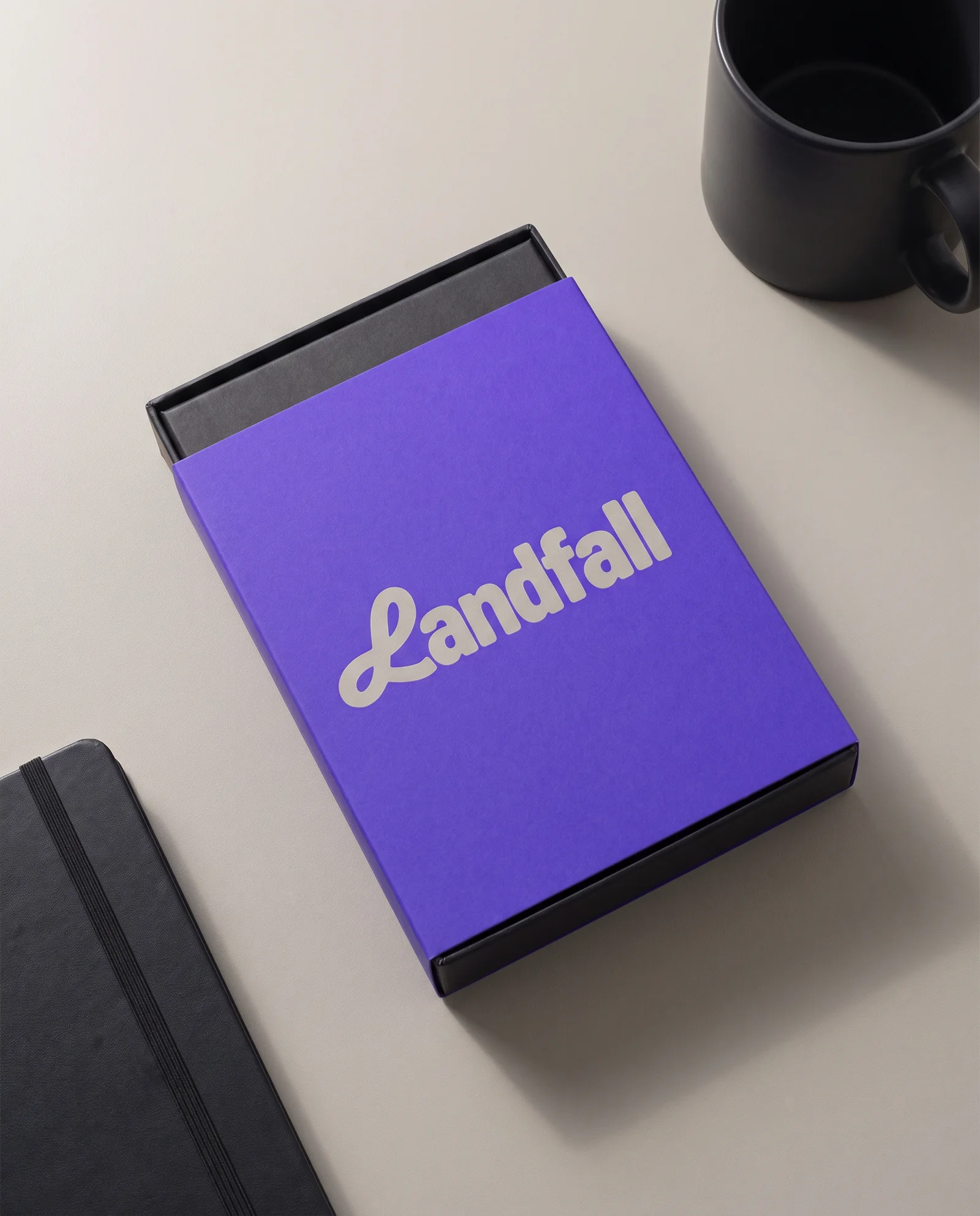 A violet welcome-kit sleeve printed with the wordmark