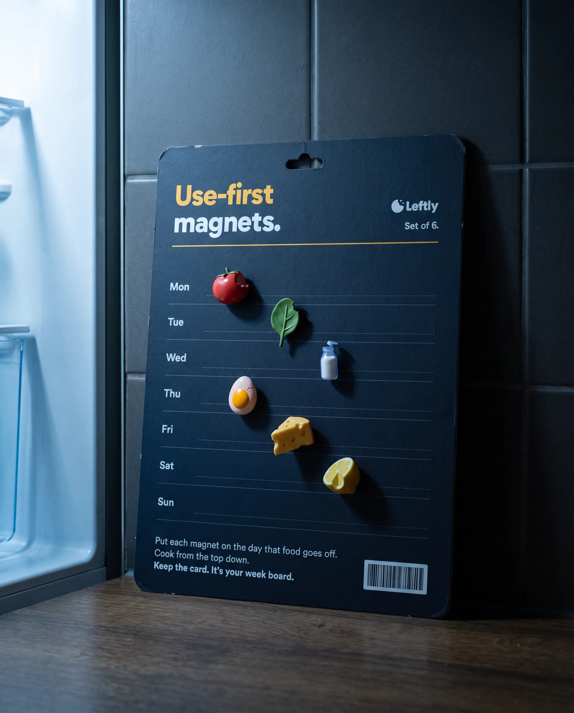 A Leftly use-first magnet set leaning on a fridge at night, food magnets on a week card