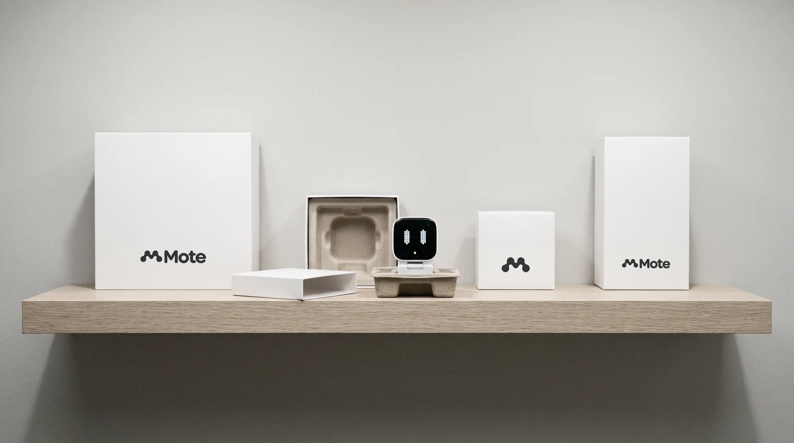 Mote retail boxes on a shelf, the clip camera awake in an open box