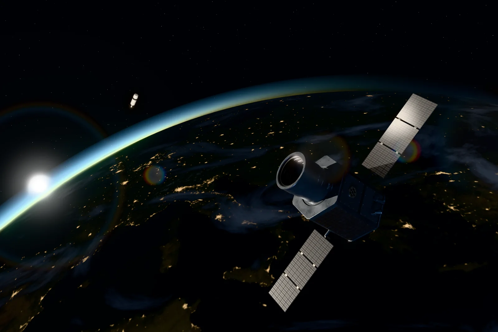 Dawn over the night side of Earth: PX-07 Witness in the foreground, a spent stage near the limb, the sun flaring at the edge