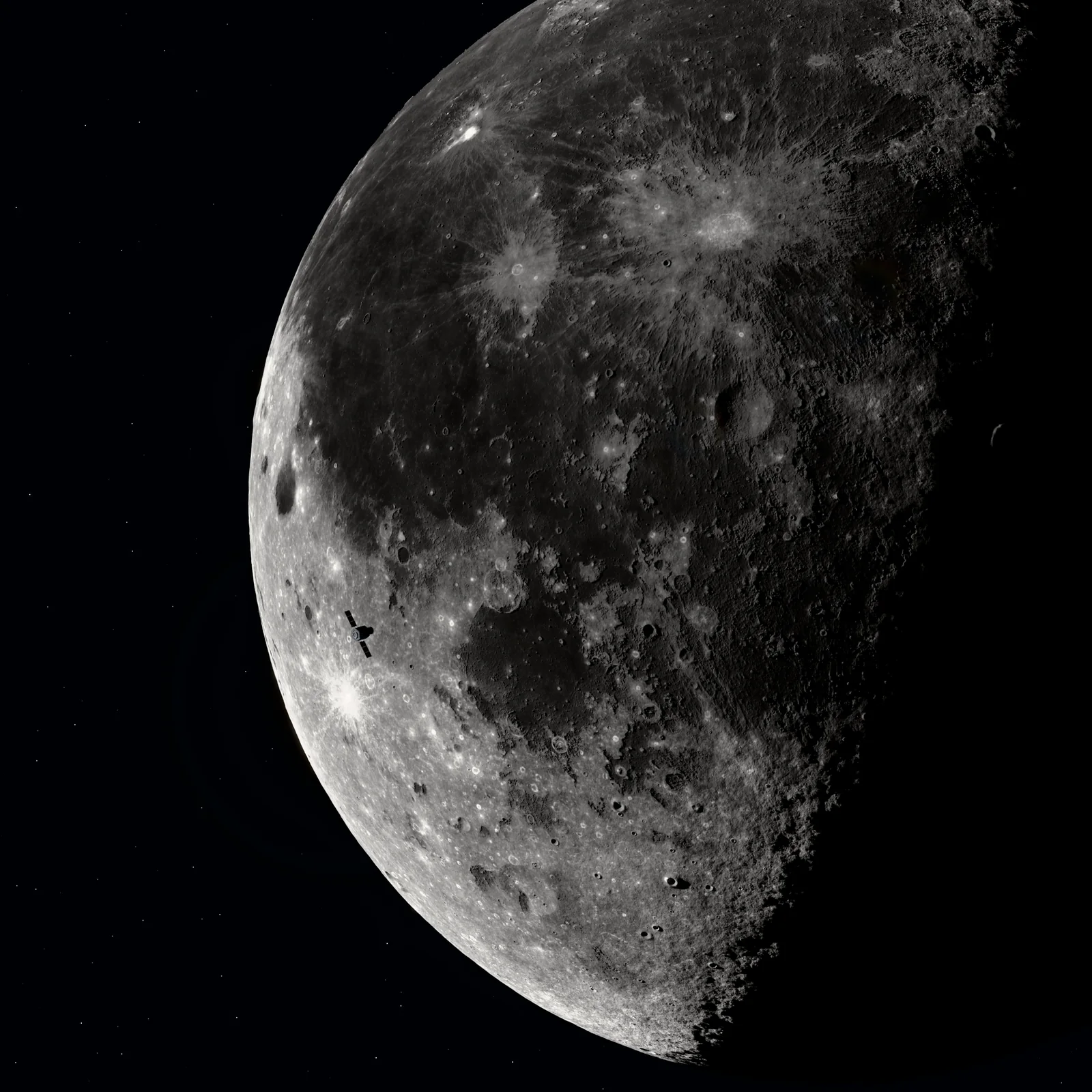 The Moon at the terminator with a small Witness satellite crossing its disc