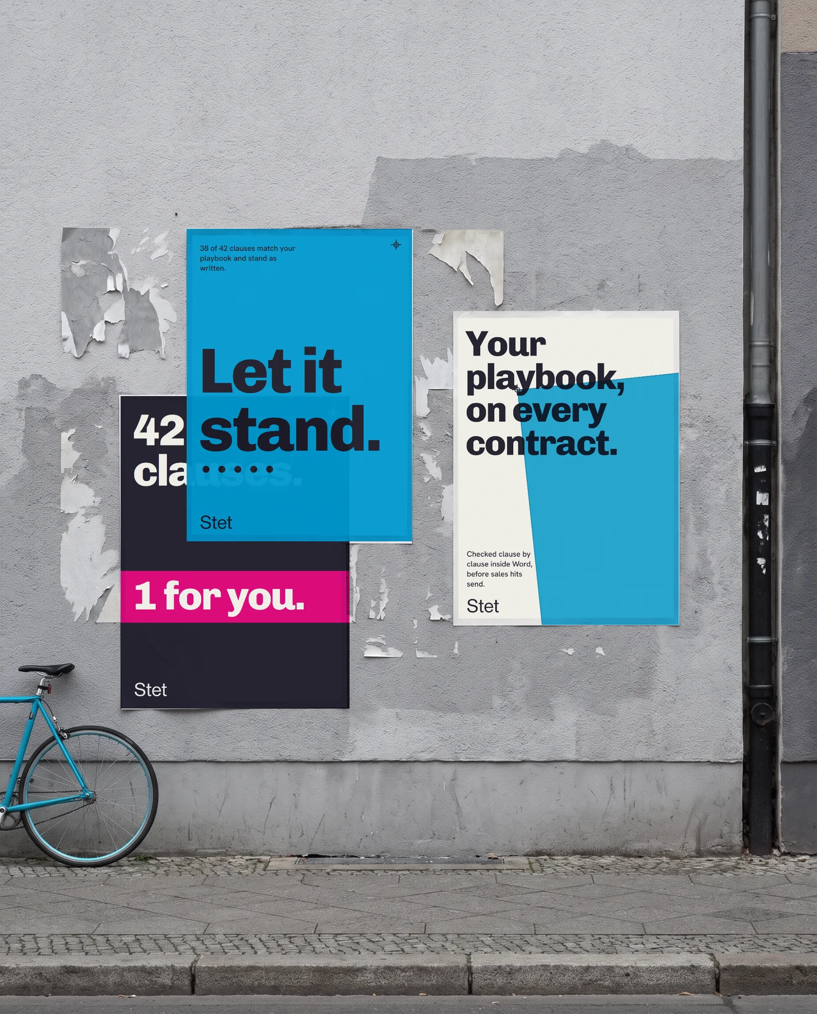 Stet posters pasted on a street wall